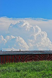 Keep an eye on the horizon. Build thunder clouds may signal it’s time to get off the water, but it can also predict a hot bite before you do.