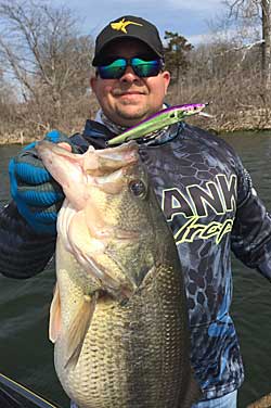 Rick Fishback picks wild colors for his jerkbaits to catch early-season big bass in cold, clear waters. 