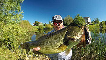 Not all urban bass fishing happens on the industrial waterfront. Ponds constructed as part of housing developments are home to big bass, too. Photo courtesy of Ray Quijano