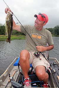 Dave Jerome with a good bass taken from a small lake using a two-man bass tub to get around and access the lake. Images by Dave Jerome and Stacy Vobach