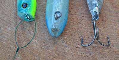 Tying a loop knot, moving the line tie backward, and using a large rear hook will make your walking topwater easier to use by adding freedom of movement and changing the lure's balance. Photo by Pete M. Anderson