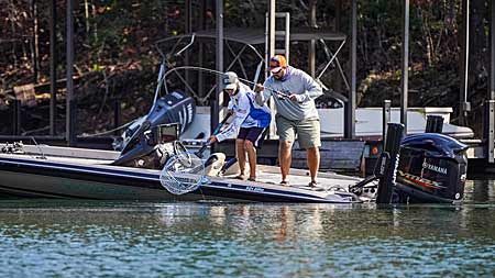 Power fishing plays a role in bass-tournament co-angler Justin Kimmel’s success. But he’s learned to use spinning rods, too. That versatility is important when you don’t have a choice where or what you’ll fish. Photo courtesy of MLF / Photo by Ron Matsuura