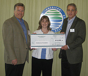 Terry Pederson (left), Daiwa Corporation's vice president of sales, presents FishAmerica Foundation Executive Director Johanna Laderman and ASA President and CEO Mike Nussman with a $10,000 contribution at the recent 2008 Sportfishing Summit.