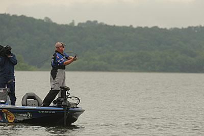 Long casts will help you keep up with fall smallmouth, which are on the move, following migrating baitfish between clumps of aquatic vegetation. Photo courtesy of B.A.S.S. / Seigo Saito