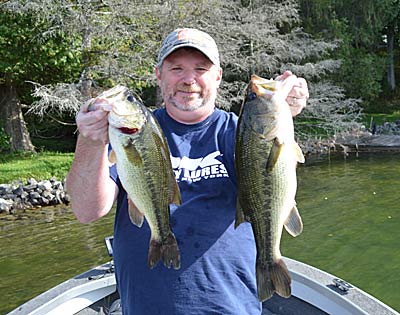 There’s no getting around it: Finding a hot spot requires work. But that task becomes easier if you apply some bass-fishing knowledge. That shortcut produced these bass during a first trip to a Northern natural lake. Photo by Pete M. Anderson