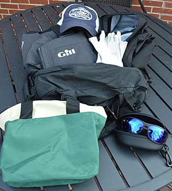 Bring foul-weather gear even when the forecast is sunny skies? You bet. It will keep you dry on rough boat rides and warm in cold winds. Pack it, sun protection and a soft-sided cooler in a small duffle bag. Photo by Pete M. Anderson