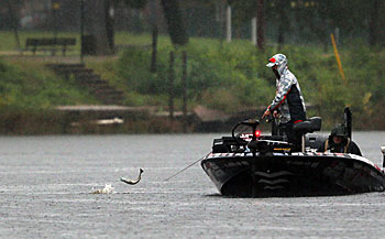 Bass anglers, including those who compete on the Bassmaster Elite Series, fish regardless of weather, except hurricane-force winds or lightning. Learning how conditions affect the water, the bass and you means more fun and catching. Photo courtesy of B.A.S.S. / Gary Tramontina