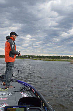 Rain can affect fishing even before it arrives. The falling air pressure and increasing clouds that precede it put bass on the feed. Photo by Pete M. Anderson