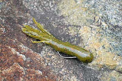 Tube jigs pack a big punch in a small package. They skip well into tight places and generate bites from pressured bass. Photo by Pete M. Anderson