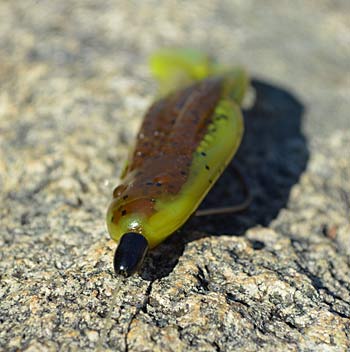 Make your soft-plastic toad a better bass catcher by adding a small bullet weight, which keeps its head down and legs kicking. [PHOTO BY PETE M. ANDERSON]