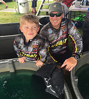 Greg Vinson and son at the weigh in tank