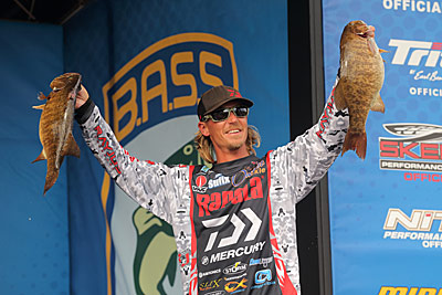 When smallmouth are shallow in spring and early summer, Bassmaster Elite Series angler Seth Feider reaches for a light weight marabou jig. Its subtle action is too much for them to resist, he said. Photo courtesy of B.A.S.S. / Seigo Saito