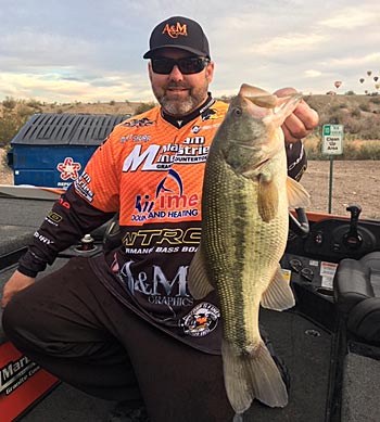 Matt Shura with his 5 lb largemouth that was waiting for him on our first spot. Caught on a white spinnerbait.