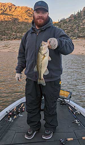 Justin Welch with a chunk bass caught on a crankbait.