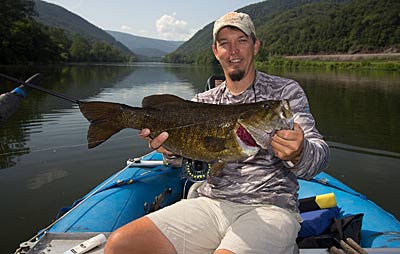 Fishing guide Britt Stoudenmire catches some of his biggest smallmouth of the year when the rivers near his Virginia home run low and clear in late summer and fall. He believes the increased visibility makes the bass more efficient feeders. Photo courtesy of Britt Stoudenmire