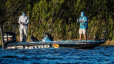 When it comes to choosing a lure for bass fishing during a mayfly hatch, FLW Tour angler Shane Lineberger keeps it simple. He ties on a black topwater, usually a popper, walking bait or buzzbait. He said the color and styles best imitate a “blob” of the bugs struggling on the surface. Photo courtesy of FLW Outdoors / Andy Hagedon