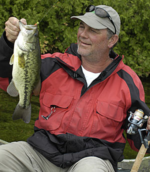 The author caught this respectable largemouth using a tiny twister-tailed jig.