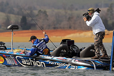 Bassmaster Elite Series angler Jamie Hartman assigns a specific purpose to each of the four fish finders on his boat. The two on the bow, for example, display mapping, down scan and traditional 2-D sonar, keeping him on top of the bass he is trying to catch. Photo courtesy of B.A.S.S. / Saigo Seito