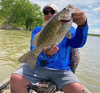 Guide Donald Hedge doesn’t run around all 43,000 acres of Lake Pickwick when chasing its giant smallmouth. Instead, he fishes where most live, the tailwaters below two dams. Photo courtesy of Donald Hedge