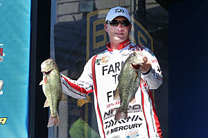 Bassmaster Elite Series angler Andy Montgomery catches bass like these by skipping his jigs into places under docks that other anglers can’t reach. Photo courtesy of B.A.S.S./Gary Tramontina