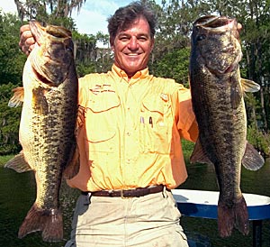 Doug Hannon with a pair of bass