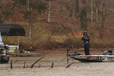 Water temperature, amount of daylight, and other variables play roles in bass movements during the prespawn season, according to Bassmaster Elite Series angler Greg Hackney. High water always makes shallow cover inviting to anglers, for example, but bass won’t be there if it’s too early in the season. Photo courtesy of B.A.S.S. / Seigo Saito