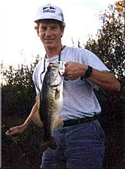 Rod Brown with a bass caught on a frog.