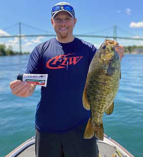 Scent is an important part of New York tournament angler Brad Paradis’ bass-fishing approach. Not only does it attract bass — even those made wary by fishing pressure — to his lure, it convinces them that his offering is real and makes them hold it longer, creating better hookups. Photo courtesy of Brad Paradis