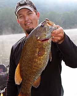 Smaller bodies of waters are home to big bass, like this smallmouth that Virginia guide Britt Stoudenmire caught.