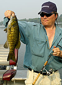 Spinning reels lend themselves more to finesse techniques like drop shotting, shaky heads and tubes when trying to fool spooky smallmouth bass.