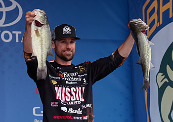 Springtime cold fronts, because of their frequency, affect bass less than those that interrupt the stability of summer weather, said Bassmaster Elite Series angler John Crews. Photo courtesy of B.A.S.S. / Gary Tramontina