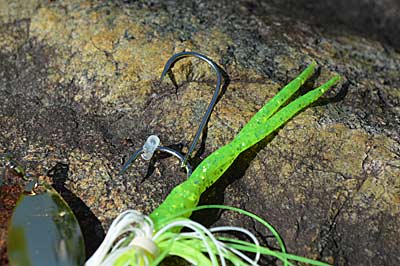 Add a trailer hook to your spinnerbait to snag short strikers. Allow it to float freely so it tucks behind the main hook, avoiding snags. Photo by Pete M. Anderson