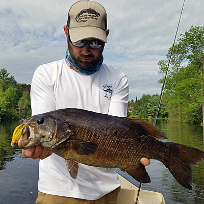 Big smallmouth do not shy away from big streamers. Wisconsin guide Tony Sandrone stocks his fly box with streamers no shorter than 6 inches. Photo courtesy of Tony Sandrone