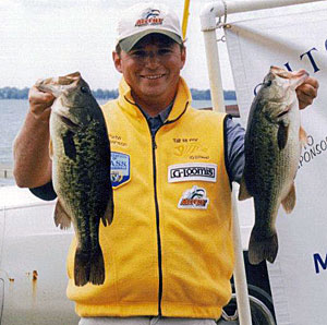 Let fast-moving lures tangle in the top of submerged weeds and then ripping them free is a great way to draw reaction strikes from big bass like these. Photo by Pete M. Anderson