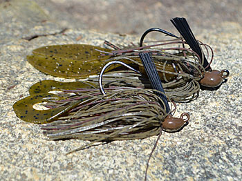 Overcoming the effects of a summertime cold front takes a wholistic approach — tackle, location and presentation. If you were getting bites on a big jig, for example, switch up to a smaller finesse version, slowly fishing it where bass were biting before the front’s arrival. Photo by Pete M. Anderson