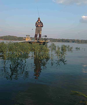 Swimming a jig through weeds is an effective way to trigger reaction strikes from bass.