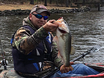 Kayaks take you where most boats cannot go. North Carolina angler Joey Randall caught this 5-pound bass from a small pond. Photo courtesy of Joey Randall