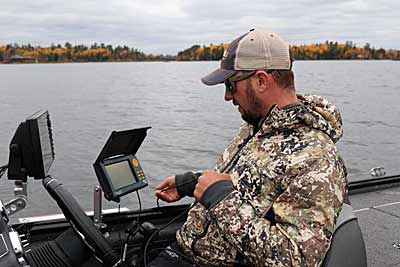 Bassmaster Elite Series angler Jeff Gustafson uses an underwater camera for two reasons. It confirms the fish that he sees on his electronics are bass, and it reveals the hard to graph sweet spots that fall bass prefer. Photo courtesy of Jeff Gustafson