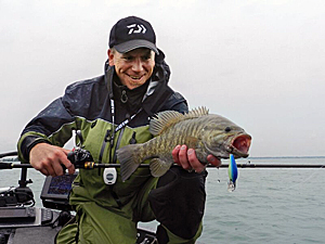 Anglers need to be willing to brave cold nasty weather sometimes to cash in on the hot fall smallmouth bite.