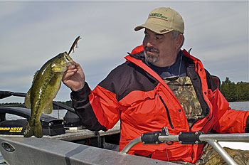 1)	Greg Ellison caught this chunky largemouth on an Upper Peninsula impoundment.