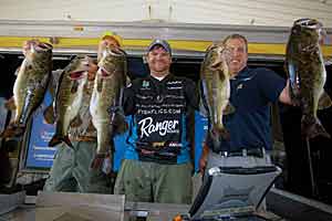 On Day 1 of the Bassmaster Classic Wild Card presented by Star Tron, Shaye Baker of Alabama leads with a five-fish limit of bass weighing 29 pounds, 8 ounces.  Photo by James Overstreet/Bassmaster