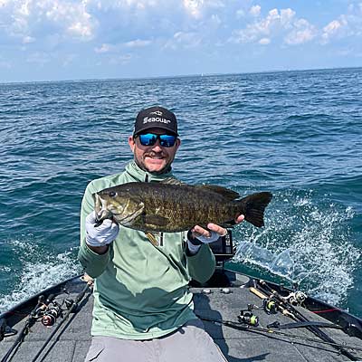 A healthy smallmouth caught in the "Mile Roads" area on a drop-shot rig during the summer.