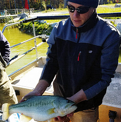 Author holding one of the bass.