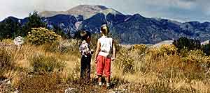 My middle brother Gary and I look at the mountains near Culebra Creek which runs directly behind us, though it cannot be seen in the photograph.