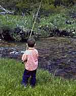 My brother, Gary, drowning a worm in Culebra Creek