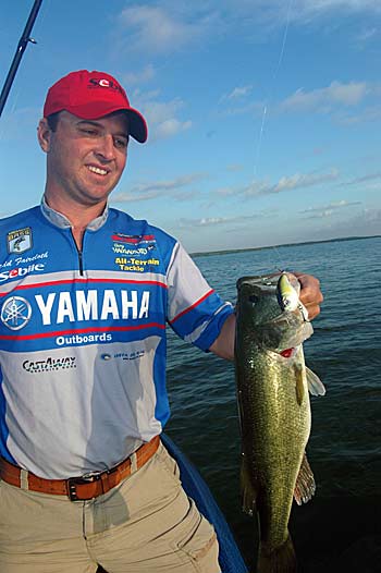 When the dog days of summer arrive, Todd Faircloth targets shallow wood in the backs of creeks with a square-bill crankbait. 