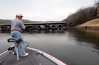 Greg West keeps his rod tip low to keep his skirted double-tail grub in constant contact with the rocky bottom during his retrieve. 