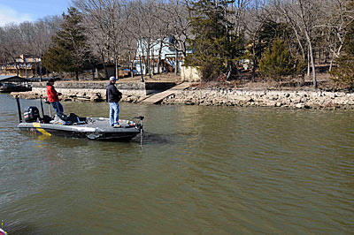 James Watson targets rocky banks to catch bass during the annual reservoir drawdown.