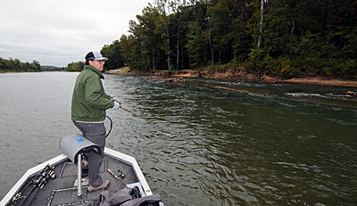 The lower half of fast water holes are favorite spots for Missouri guide Bill Smith to find smallmouth bass in the fall.