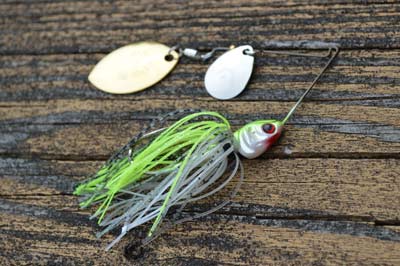 Spinnerbaits handle whatever your spring fishing presents. For example, small blades, a lightweight head, and a baitfish-colored skirt are a potent combination for river smallmouth in spring. Photo by Pete M. Anderson